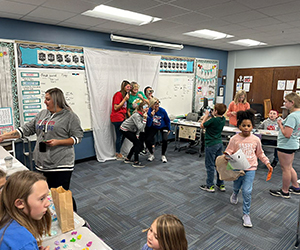 Students engaging in learning activities in the classroom
